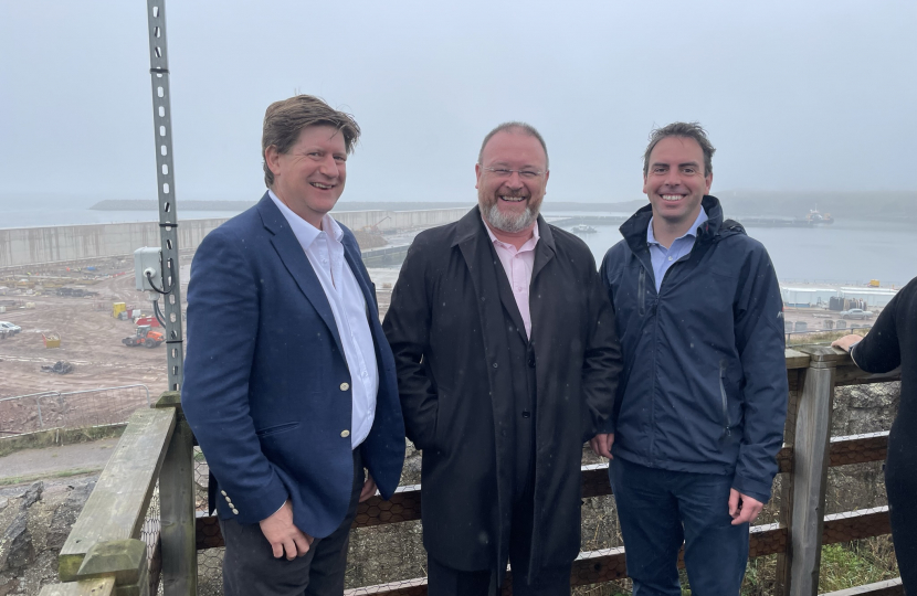 Alex is pictured with Maurice Golden and David Duguid at the harbour.